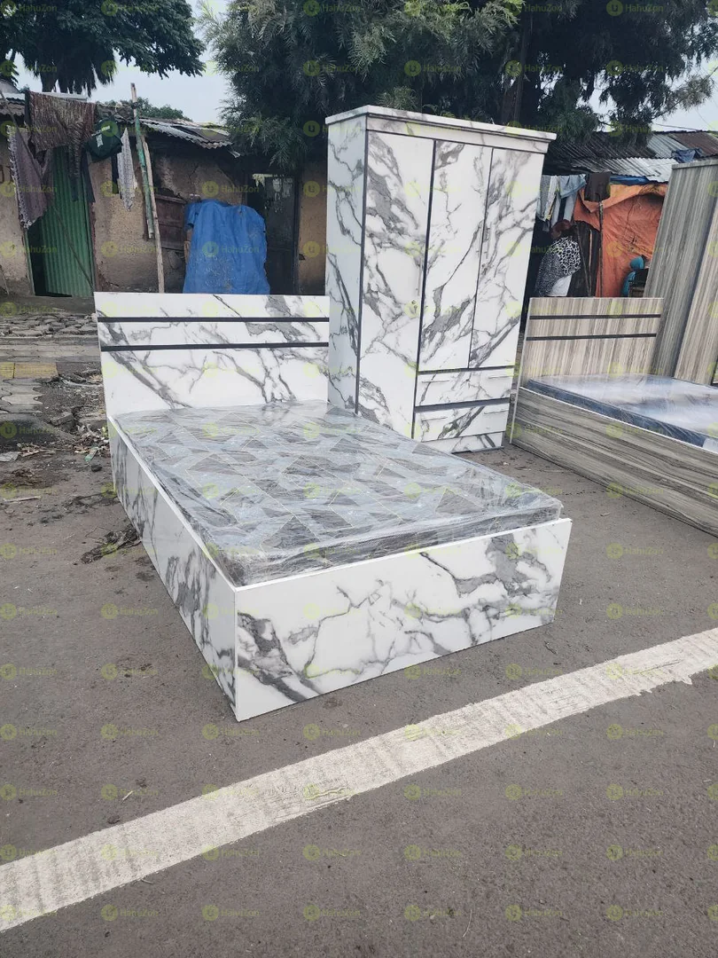 ላምነትድ አልጋና ፍራሽ + ቁምሳጥን