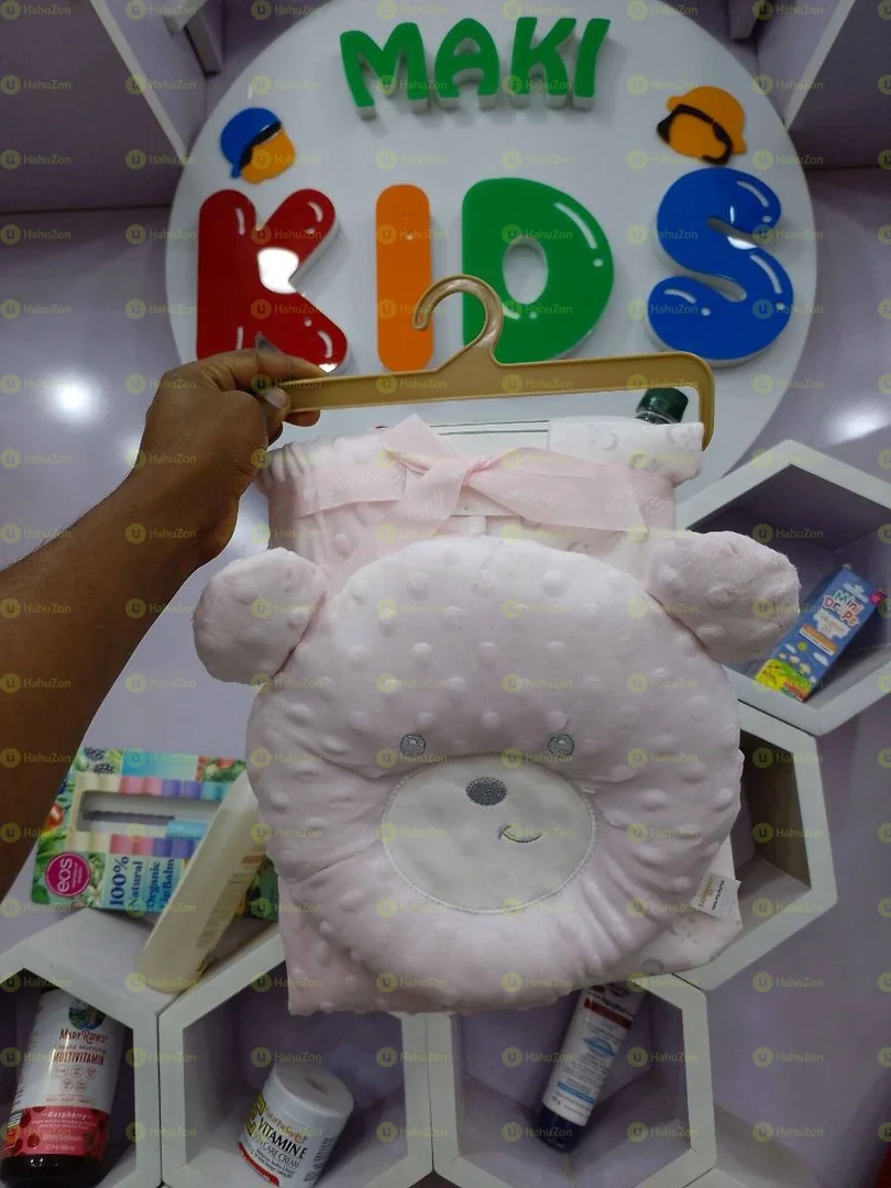 የልጆች ማቀፊያ ከትራስ ጋር