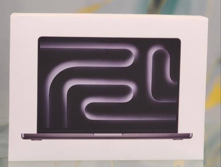 Apple  M5 chip,  a 14-inch MacBook Pro with an