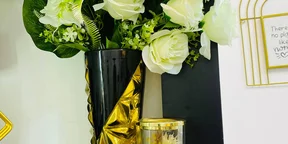 Golden and Black Ceramic Flower Vase and Bunch of Flower