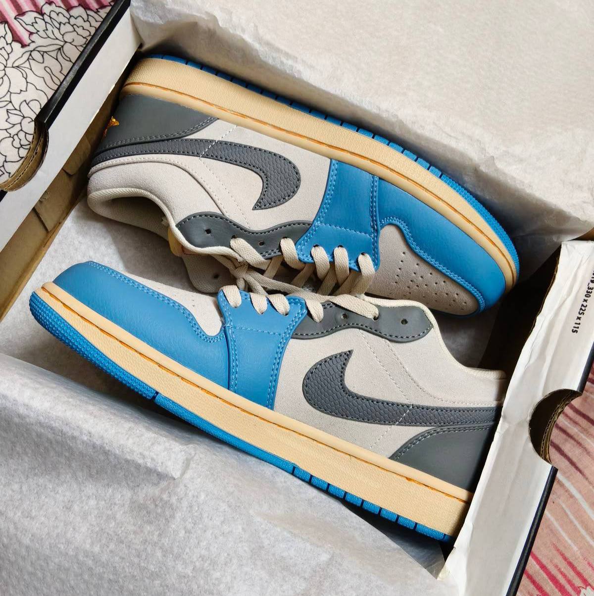 Jordan 1 Low Vintage Unc Women's Shoes