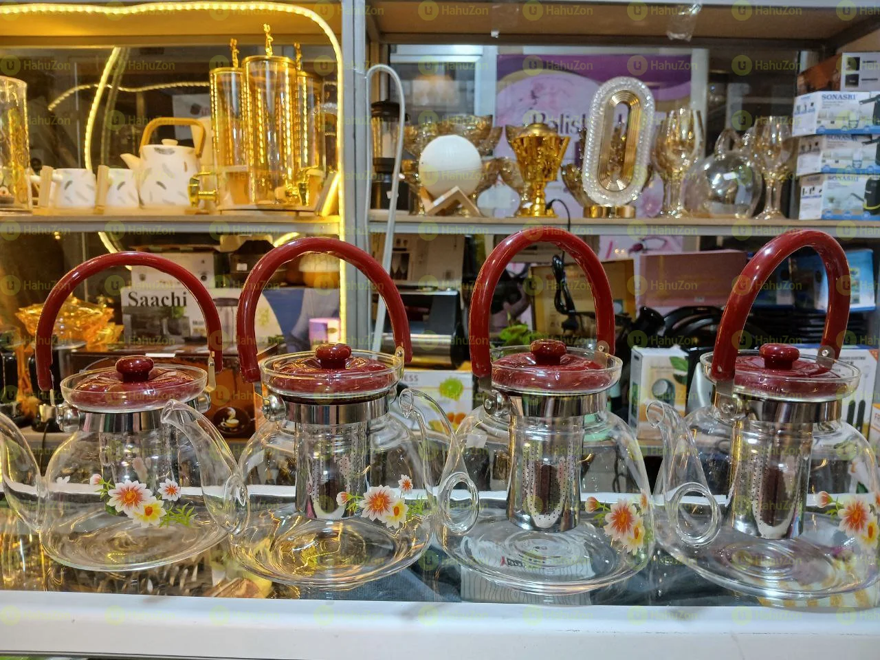 ውብ እና ማራኪ የሚጣድ ጠርሙስ የሆነ የሻይ ማፍያ