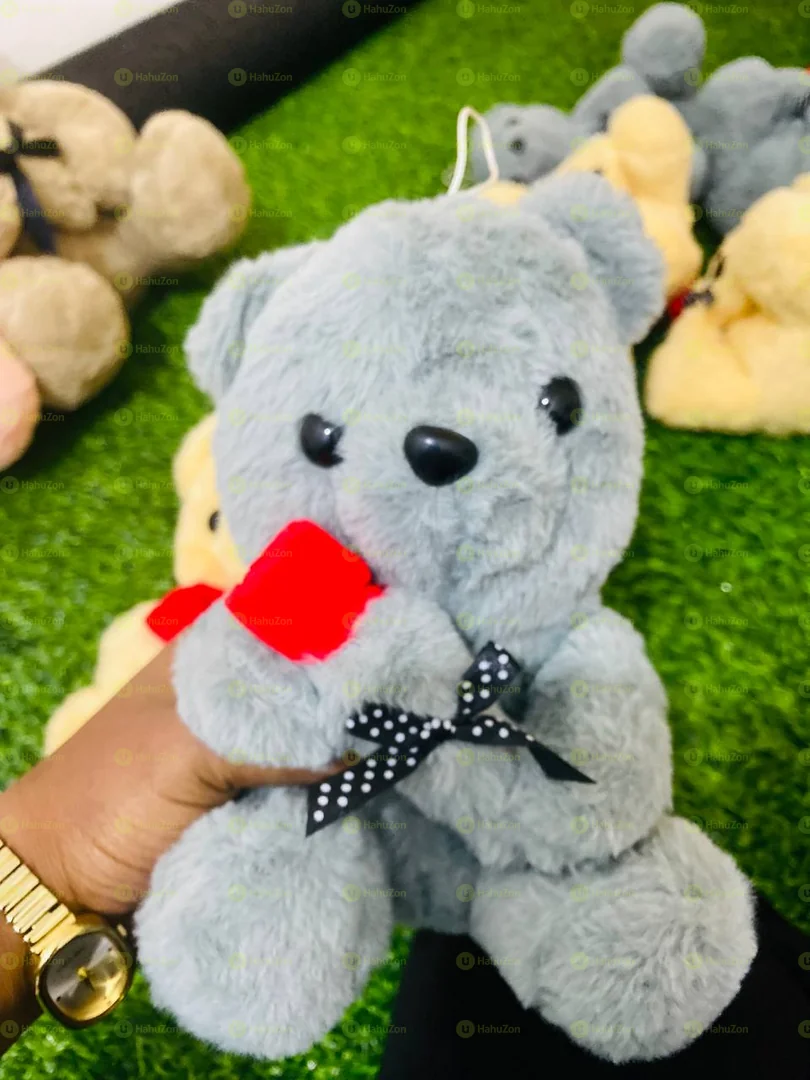 ባለ አበባ አነስተኛ ፈር አሻንጉሊት