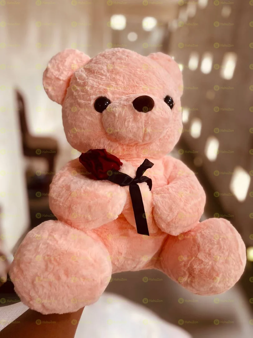 ባለ አበባ ተቀማጭ ፈር አሻንጉሊት