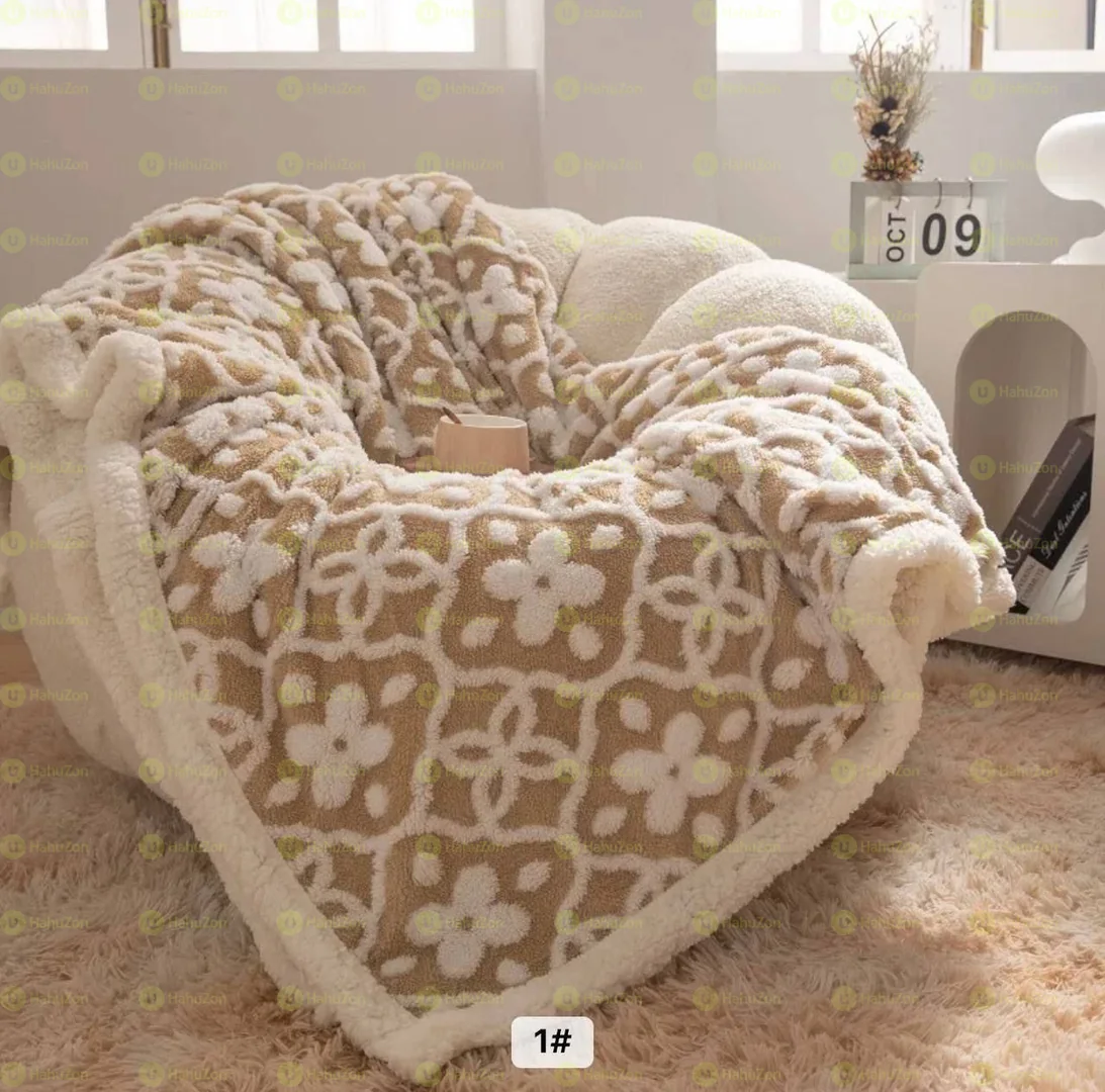 ሶፋ ላይ ቁጭ ሲሉ ትከሻ ላይ ጣል የሚደረግ