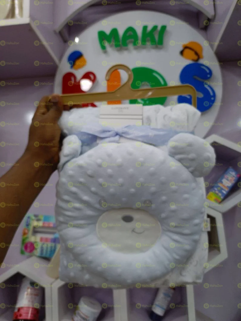 የልጆች ማቀፊያ ከትራስ ጋር